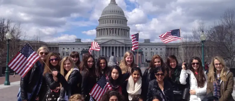 Visitors exploring Washington DC sites on a DC by Foot America 250 walking tour